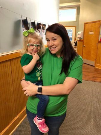 2-year-old_and_teacher_on_st_patricks_day_sunbrook_academy_at_stilesboro_kennesaw_ga-338x450