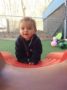 2-year-old_boy_climbing_on_playground_equipment_rogys_learning_place_east_peoria_il-333x450