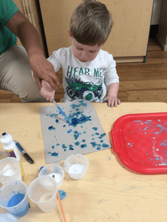 2-year-old_boy_doing_eye_dropper_art_cadence_academy_preschool_east_greenwich_ri-338x450