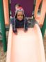 2-year-old_boy_on_slide_cadence_academy_eastfield_huntersville_nc-336x450