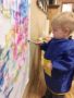 2-year-old_boy_painting_mural_rogys_learning_place_big_hollow_peoria_il-338x450