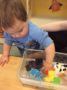 2-year-old_boy_playing_with_plastic_animals_growing_kids_academy_fredericksburg_va-336x450