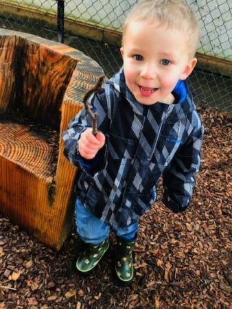 2-year-old_boy_playing_with_wand_at_cadence_academy_preschool_clackamas_or-338x450