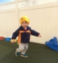 2-year-old_boy_running_on_playground_cadence_academy_preschool_east_greenwich_ri-412x450