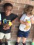 2-year-old_boys_enjoying_icees_at_cadence_academy_preschool_summerville_sc-338x450