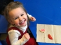 2-year-old_girl_excited_about_snack-cadence_academy_preschool_sellwood_portland_or-600x450