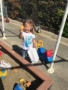 2-year-old_girl_finding_easter_eggs_at_superman_preschooler_cadence_academy_preschool_rocklin_ca-338x450