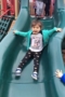 2-year-old_girl_going_down_slide_at_next_generation_childrens_centers_beverly_ma-300x450