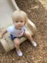 2-year-old_girl_going_down_slide_winwood_childrens_center_gainesville_ii_va-333x450