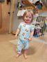 2-year-old_girl_in_frozen_pajamas_cadence_academy_preschool_milwaukie_portland_or-338x450