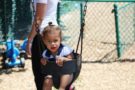 2-year-old_girl_in_swing_at_cadence_academy_preschool_lexington_sc-675x450