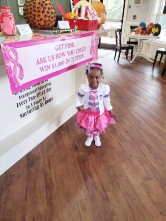 2-year-old_girl_promoting_fundraiser_sunbrook_academy_at_stockbridge_ga-338x450