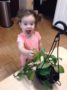 2-year-old_girl_with_plant_stonebridge_academy_bremen_ga-336x450