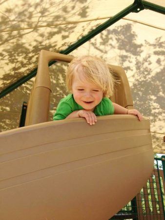 2-year-old_going_down_slide_at_cadence_academy_preschool_charleston_sc-338x450