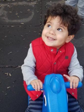 2-year-old_on_rocking_horse_winwood_childrens_center_fairfax_va-338x450