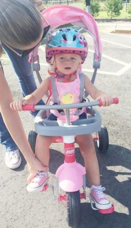 2-year-old_on_tricycle_at_cadence_academy_preschool_steele_creek_charlotte_nc-259x450