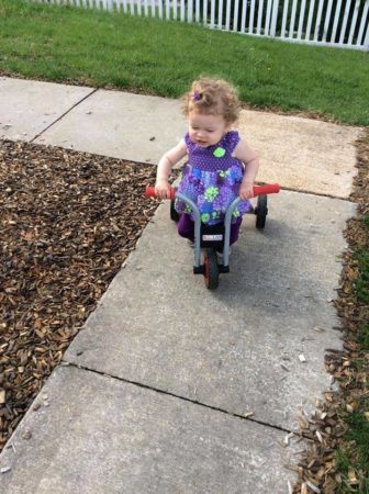 2-year-old_on_trike_cadence_academy_ofallon_mo-336x450