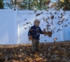 2-year-old_playing_in_leaves_next_generation_childrens_centers_natick_ma-512x450