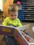 2-year-old_reading_book-canterbury_academy_at_shawnee_crossings_shawnee_ks-600x450