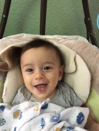 2-year-old_smiling_at_cadence_academy_preschool_i_street_sacramento_ca-338x450