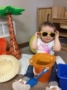 2-year-old_wearing_sunglasses_inside_cadence_academy_preschool_urbandale_ia-333x450