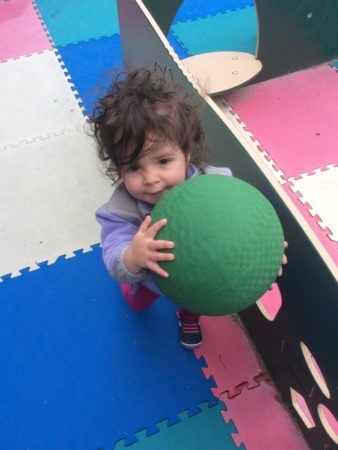 2-year-old_with_kick_ball_at_cadence_academy_preschool_seekonk_ma-338x450