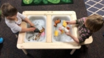 2-year-olds_cleaning_animals_with_soapy_water_cadence_academy_preschool_sellwood_portland_or-752x420