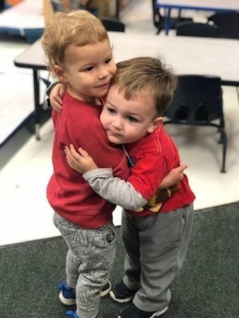 2-year-olds_hugging_winwood_childrens_center_reston_va-338x450