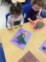 2-year-olds_painting_cadence_academy_preschool_iowa_city_ia-336x450
