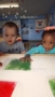 2-year-olds_playing_with_colored_bags_on_light_table_cadence_academy_preschool_brentwood_portland_or-253x450
