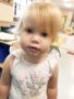 2_year_old_girl_staring_into_camera_cadence_academy_preschool_mount_pleasant_sc-338x450