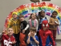 Children smiling with spiderman in classroom at preschool and daycare cadence academy preschool 502 spring hill