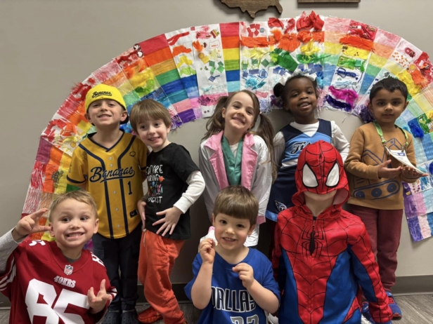 Children smiling with spiderman in classroom at preschool and daycare cadence academy preschool 502 spring hill