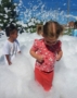 children playing in foam