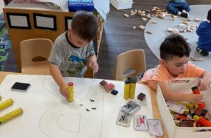 children using dot painters