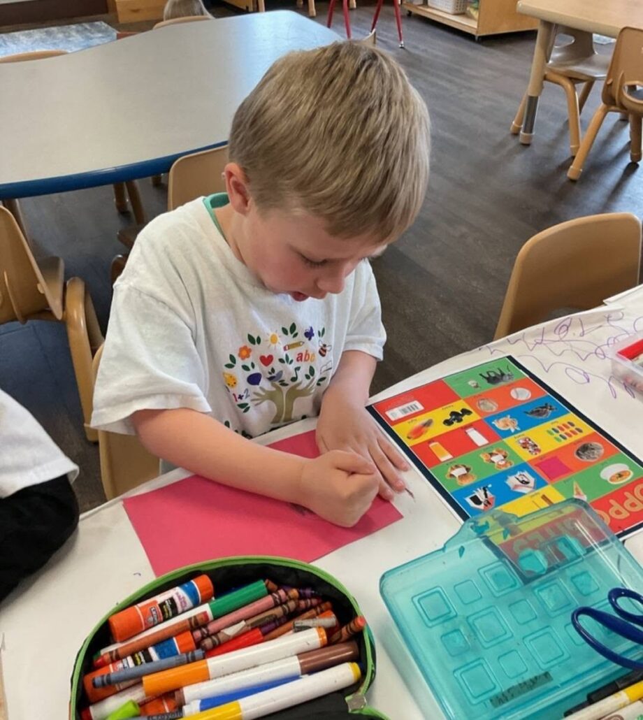children practicing drawing