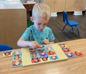 child learning with hands on activity