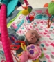 infant playing on tummy