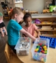 children playing in toy bucket