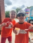 children smiling with snowcones at crestwood