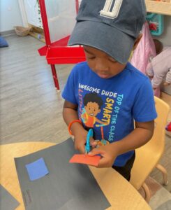child doing hands on activity at cadence academy preschool and daycare branch hollow carrollton texas