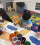 child doing hands on activity at cadence academy preschool and daycare branch hollow carrollton texas