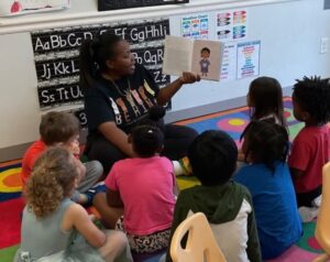 Children learning from teacher at cadence academy preschool and daycare branch hollow carrollton texas