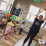 teacher teaching children dancing inside classroom at cadence academy preschool and daycare mauldin