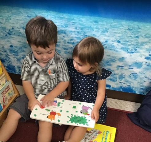 Children reading indoors