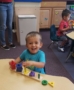 child playing with blocks at preschool and daycare at cadence academy preschool smyrna, delaware