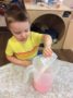 adding_sugar_to_lemonade_at_cadence_academy_preschool_columbine_littleton_co-333x450