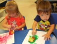 apple_painting_project_at_cadence_academy_preschool_carmichael_ca-576x450