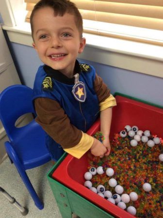 boy_playing_with_orbeez_and_eyeballs_at_next_generation_childrens_centers_walpole_ma-336x450