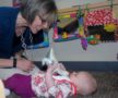 cadence-academy-dtc-centennial-co-infant-and-teacher-playing-539x450